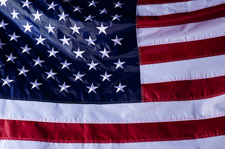 closeup shot of the waving flag of the United States of America, a Photo by 1981 Rustic studio kan