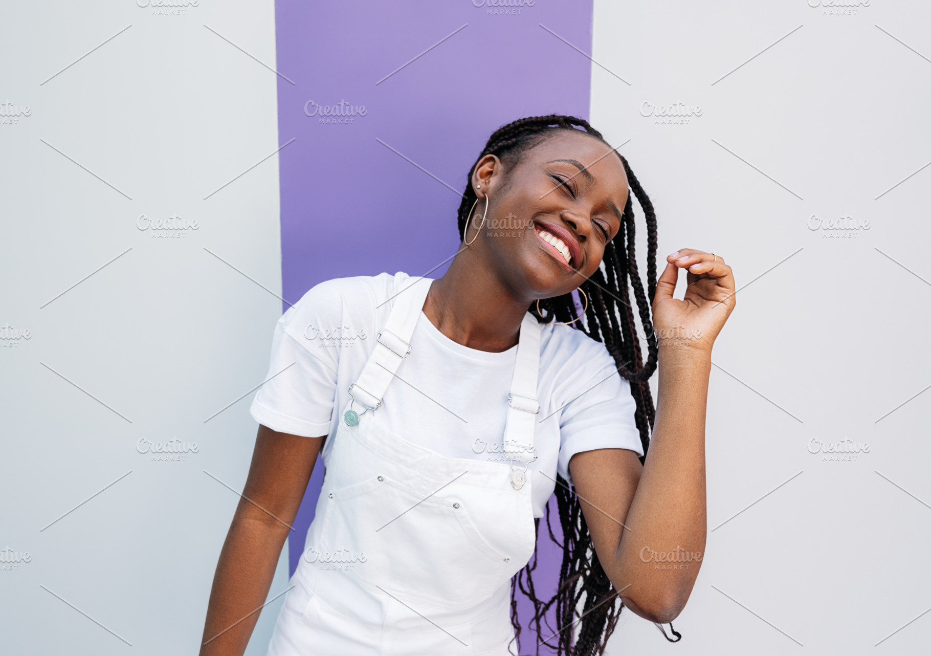 Young female with braids having fun, a Person Photo by Artem Varnitsin