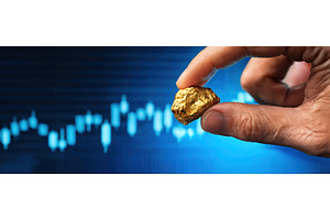 A hand holding a gold nugget with a, a Business Photo by Igor Tichonow