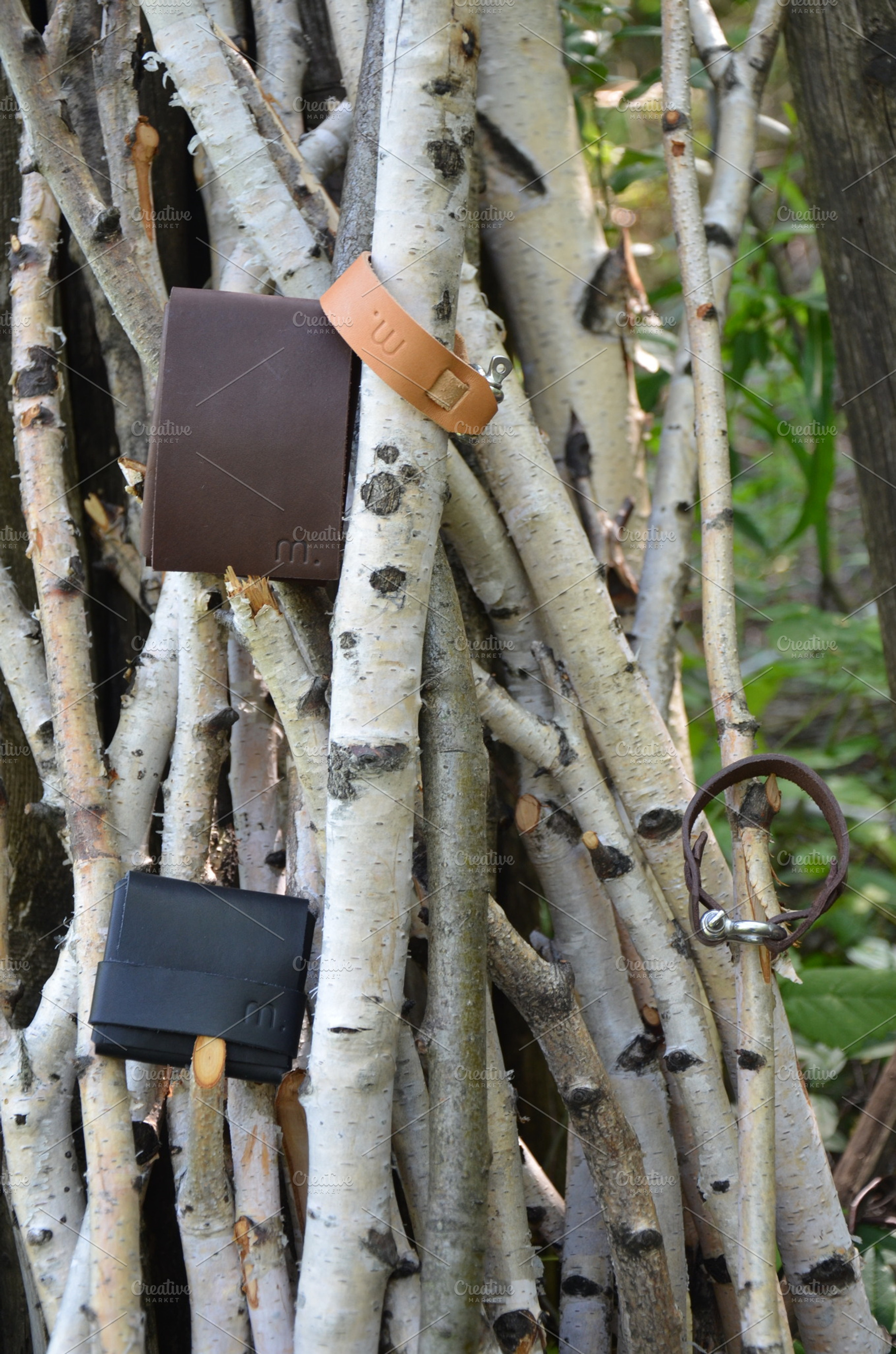 Leather products among the branches stock photo containing leather and fashion