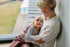 Beautiful mother hugging little son,, a Person Photo by HalfPoint