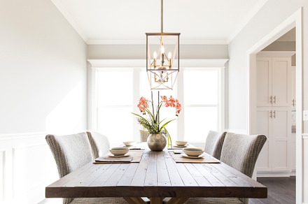 Wood table with orchid containing agent, airy, and art, an Architecture Photo by Water Street Photography