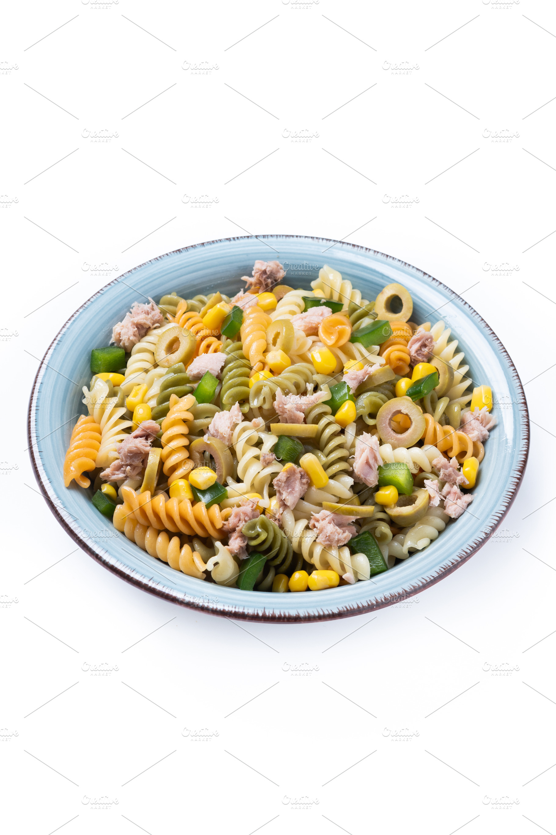 Pasta salad with tuna, corn and olives in bowl, a Food & Drink Photo by etorres69