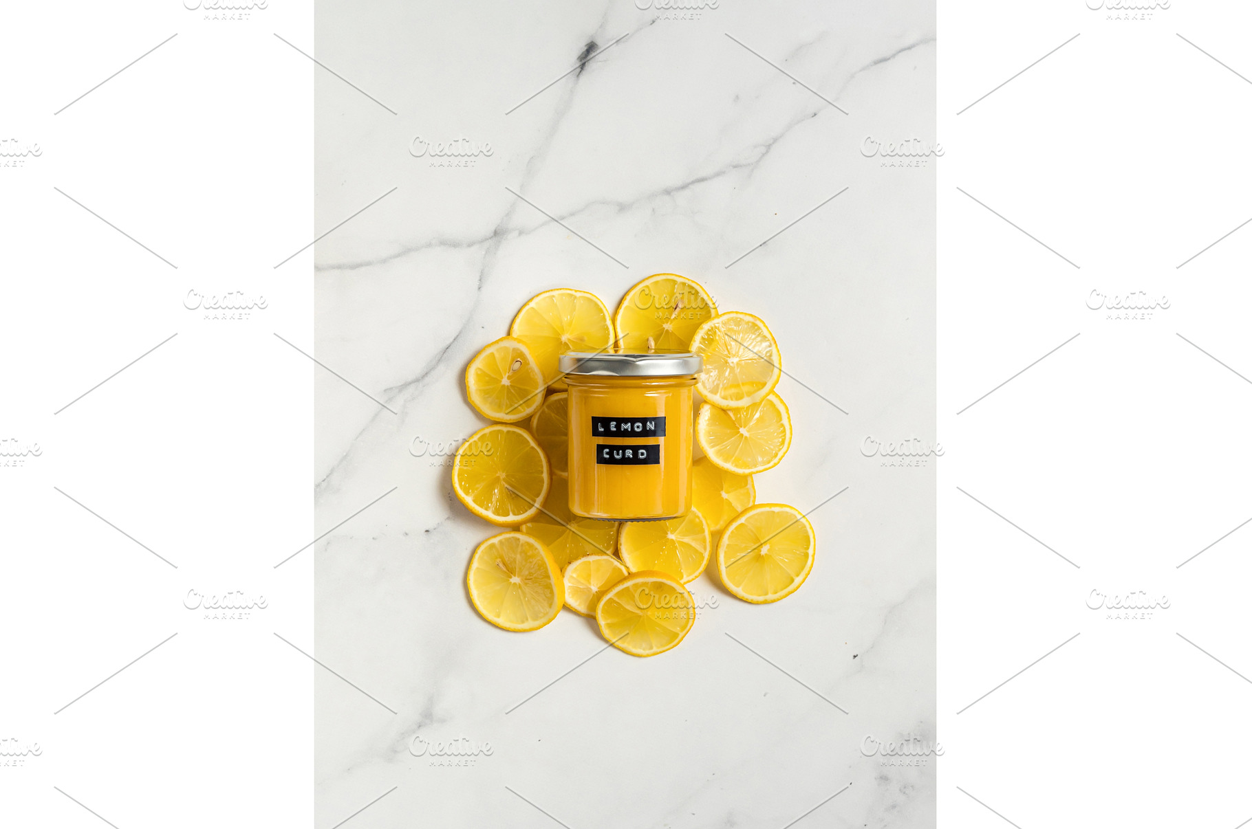 Homemade lemon curd in jar, top view, a Food & Drink Photo by Fascinadora