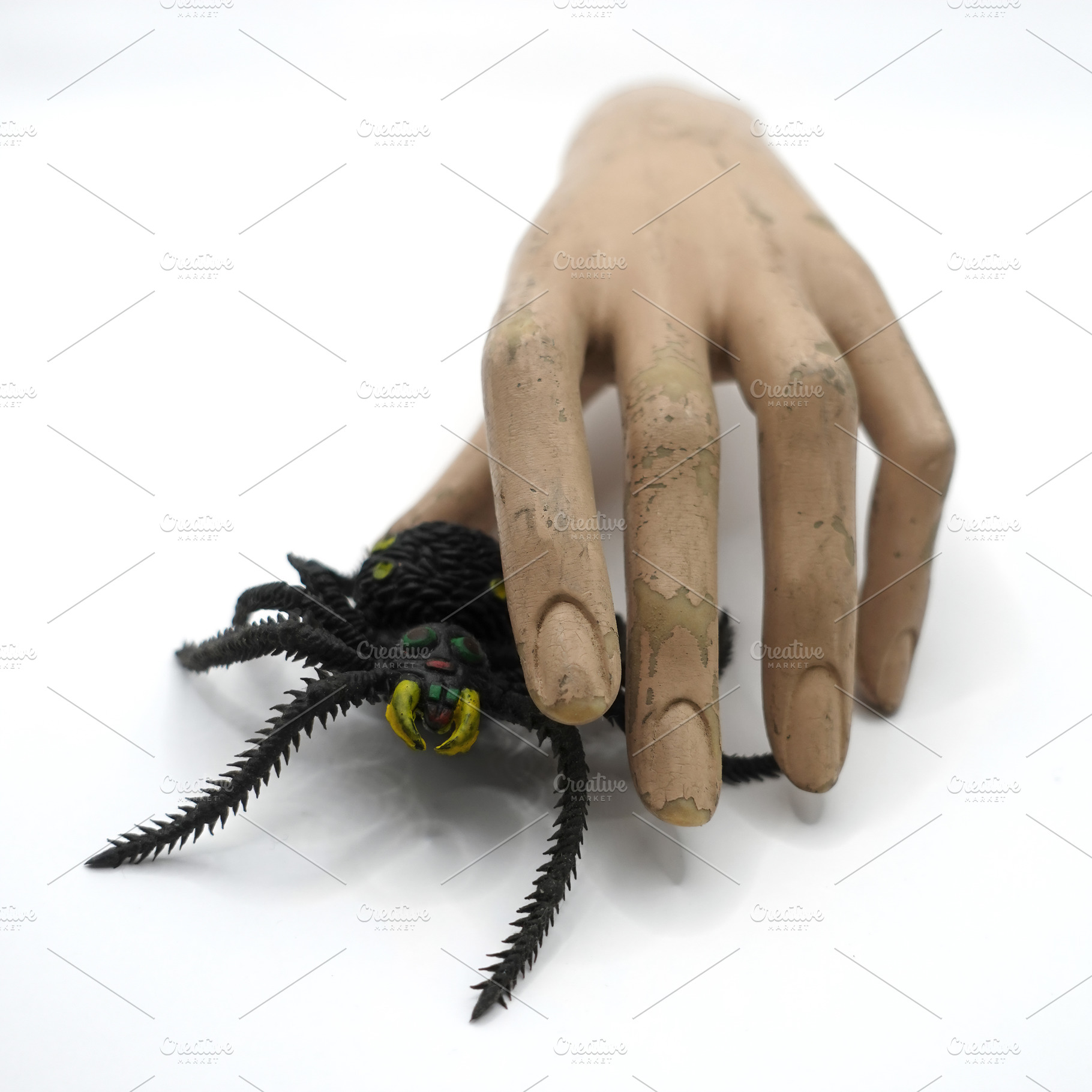 spooky toy spider and old doll hand, an Abstract Photo by sirylok