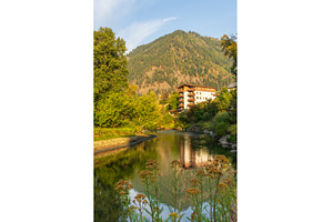 Alpine German apartment building, a Nature Photo by Backyard Stock