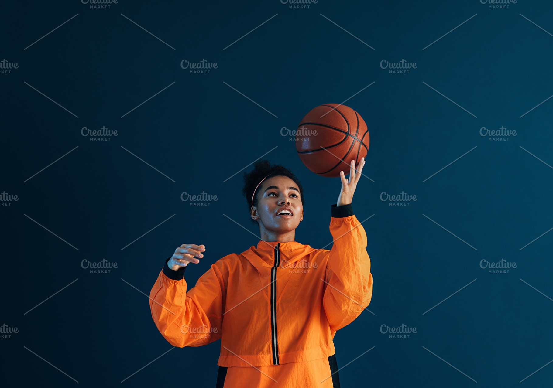 Young woman in orange sportswear, a Sports & Recreation Photo by Artem Varnitsin
