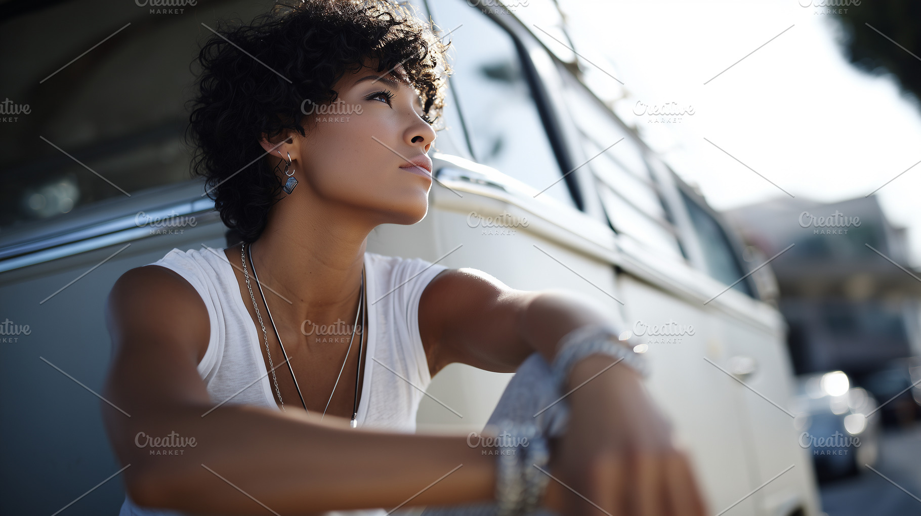 Woman with curly hair sitting though, a Person Photo by MistyDay