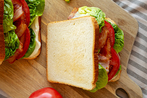 Homemade BLT (Bacon Lettuce Tomato) Sandwich with Mayo, top view, a Food & Drink Photo by LiudmylaChuhunova