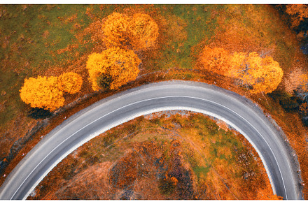 Aerial view of winding road in, a Transportation Photo by den-belitsky