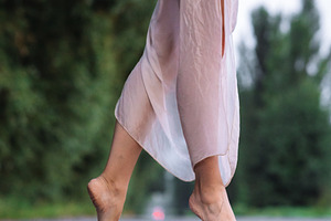 Barefoot Woman Walking on Road, a Person Photo by Red Hot Chili Pepper Shop