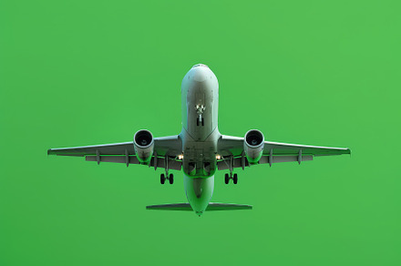 Realistic airplane is flying vector, a Background Photo by Pixeness