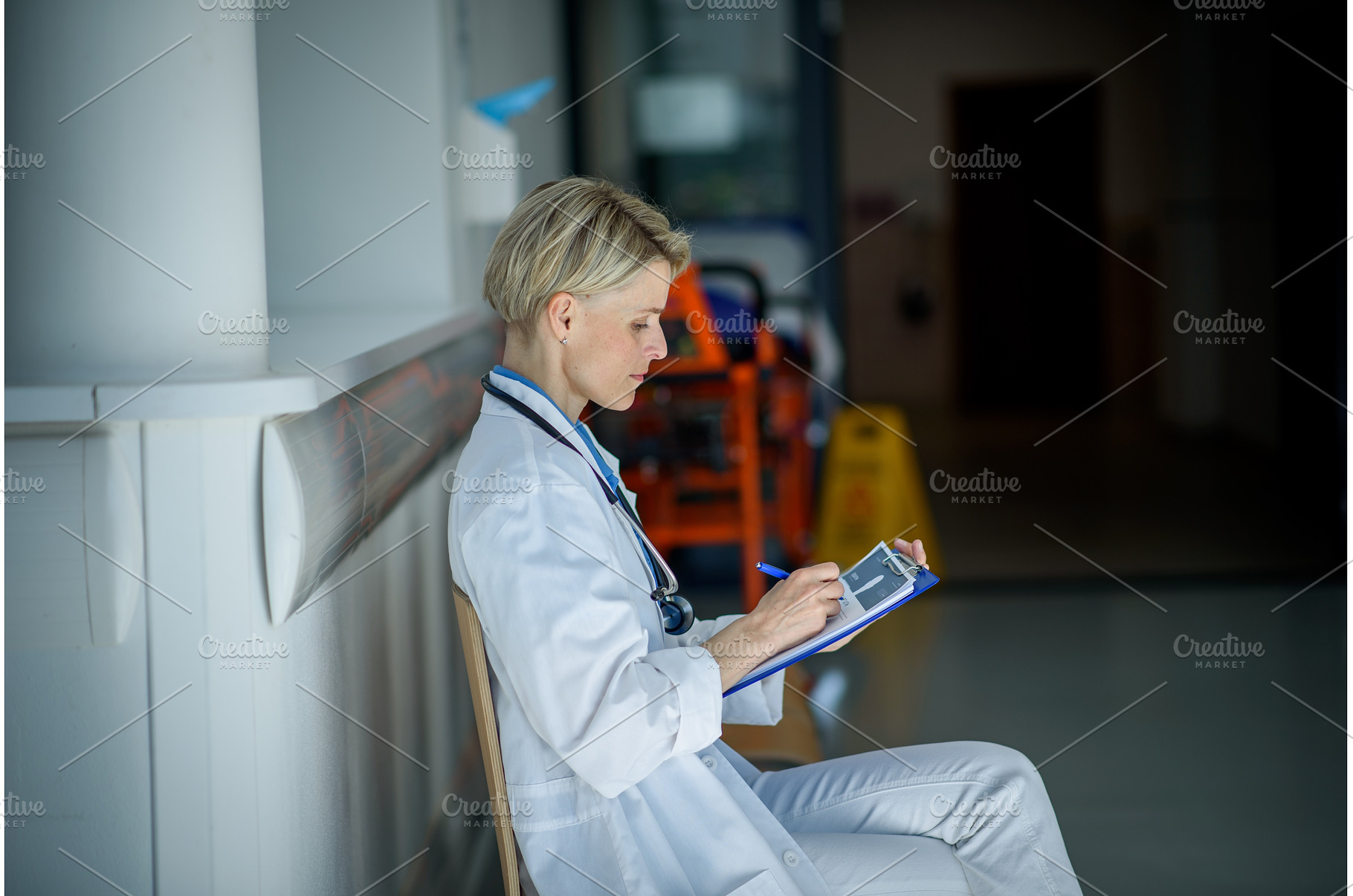 Young female doctor with short hair, a Person Photo by HalfPoint