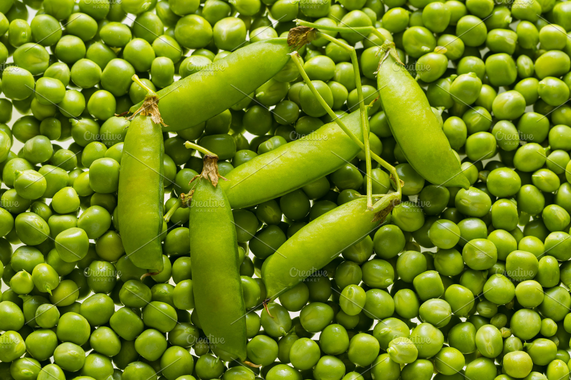 Green peas kernels featuring pea, food, and green, a Food & Drink Photo by oleghz