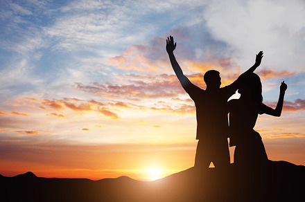 Silhouette of happy couple against c, a Background Photo by Prostock-Studio