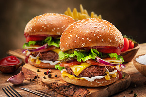 Tasty cheeseburgers and french fries, a Food & Drink Photo by Volff