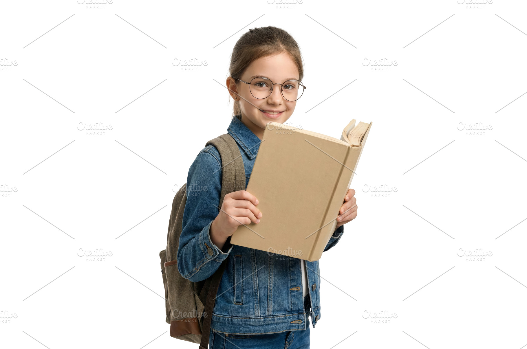 Girl Reading a Book at School, a School & Education Photo by CREATIVEDEF