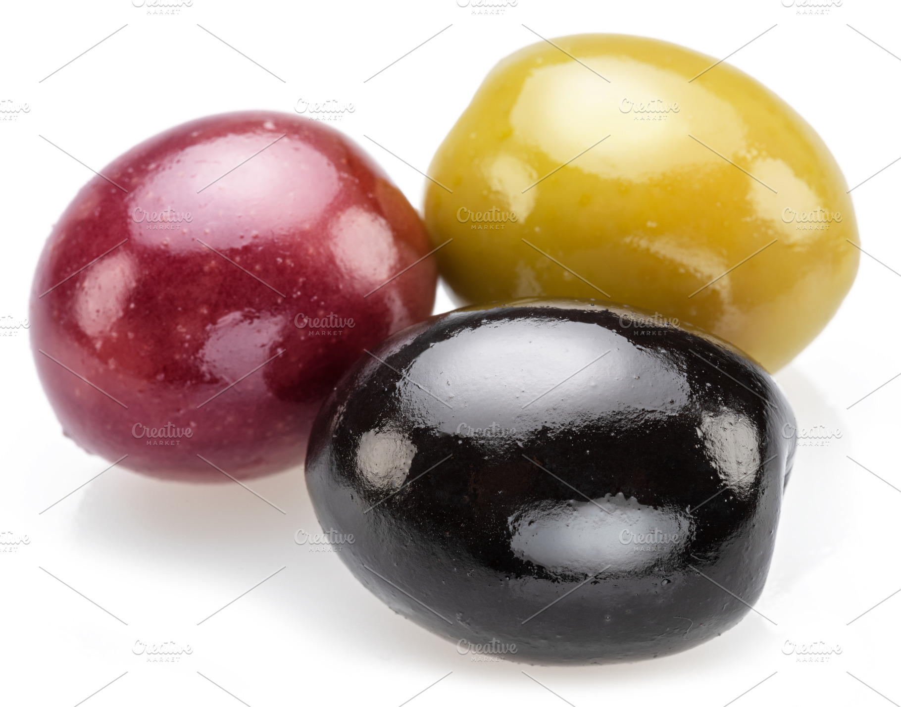 Kalamata, green and black olives isolated on white background., a Food & Drink Photo by Volff