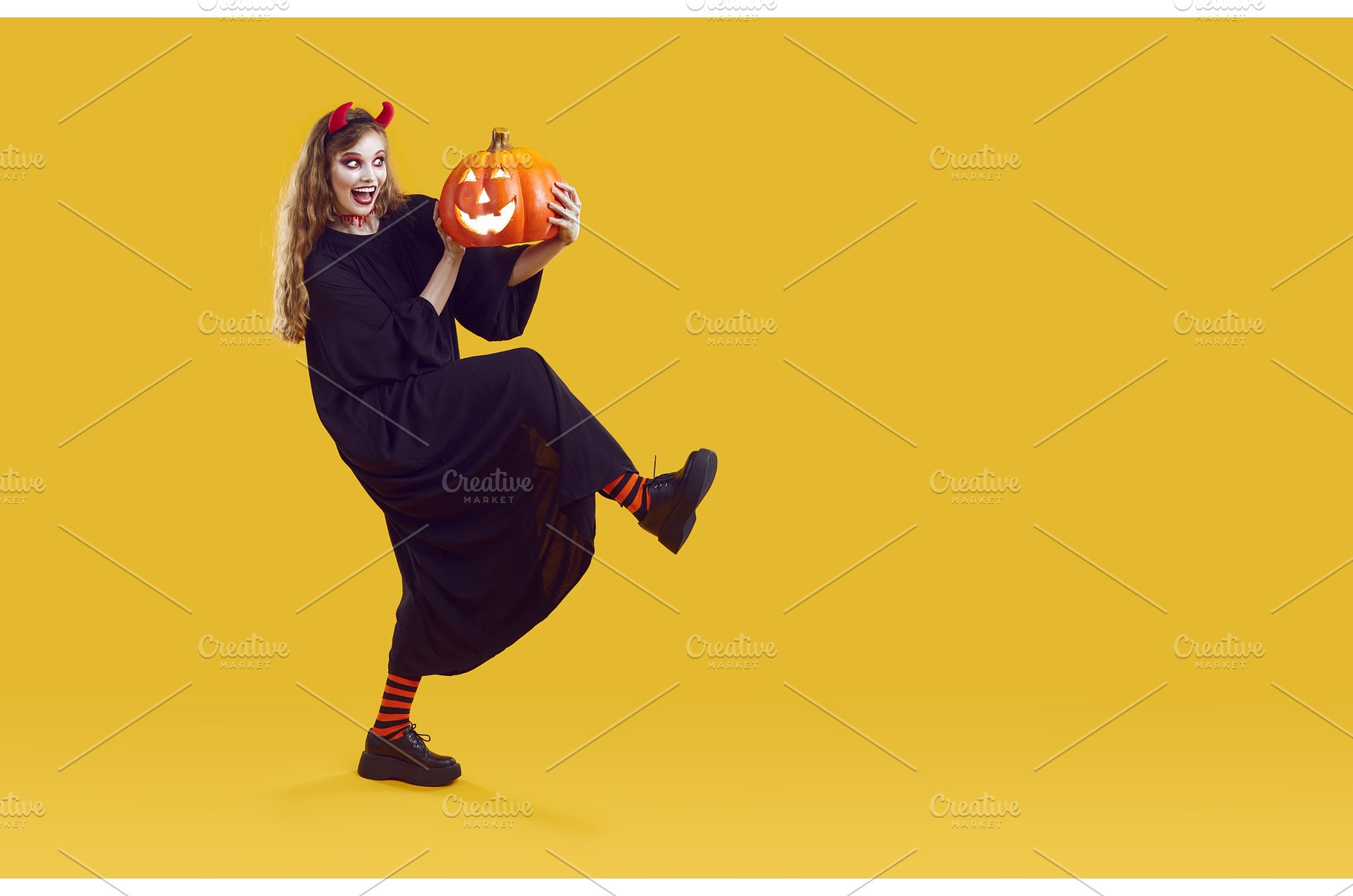 Funny woman in Halloween costume, a Person Photo by StudioRomantic