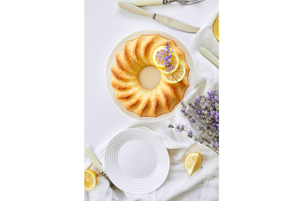 Top view of lemon cake on white, a Food & Drink Photo by IlliaBondarPhotography
