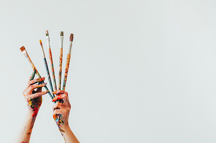 Painting supplies art tools woman painter hand, an Arts & Entertainment Photo by Photo Drive Studio