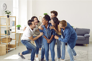 Happy young people laughing at a