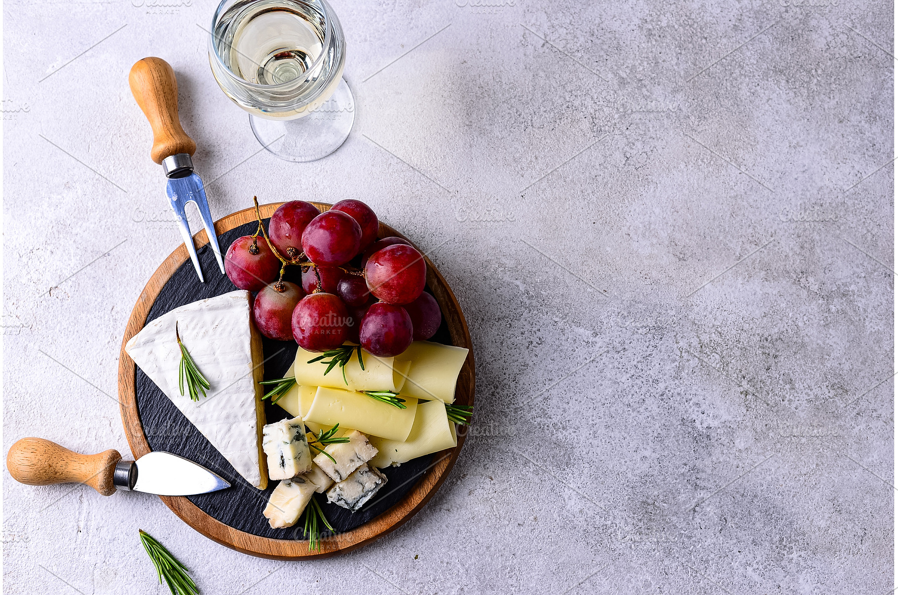 Different types of cheese, wine and, a Food & Drink Photo by Yulia Furman