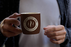 Man Holding Coffee Mug Mockup 2