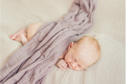 The baby is sleeping peacefully in, a Person Photo by Elizaveta Galitskaya
