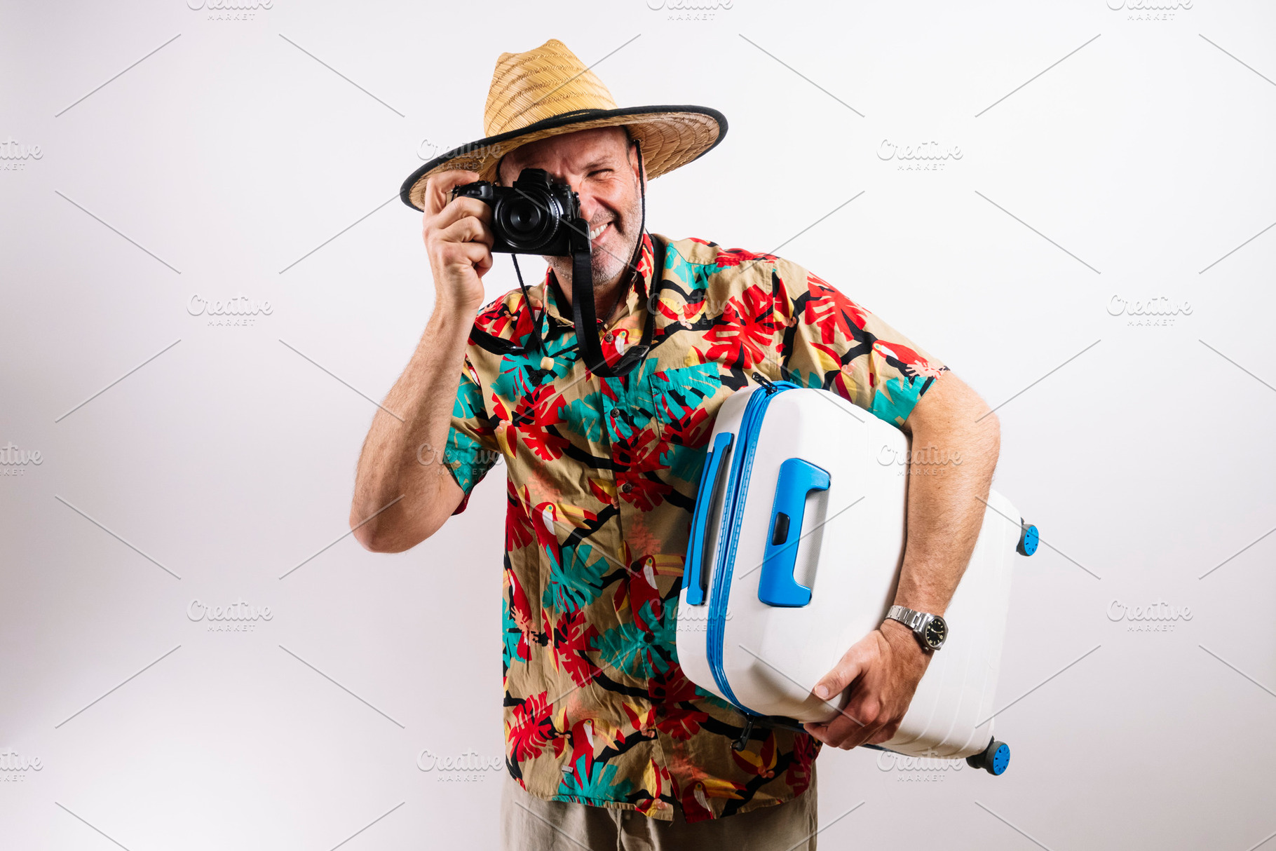 Smiling man ready for tropical vacation adventure, a Person Photo by karrastock