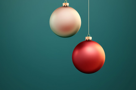 Christmas red and green matte ornaments on teal green background, a Photo by Dvoevnore photos