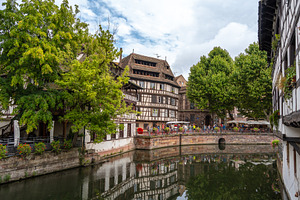 Historic canal houses in Strasbourg France reflections view, an Architecture Photo by GoodGoods