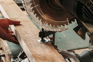 Carpeting process woodwork service joiner saw, a Person Photo by Photo Drive Studio