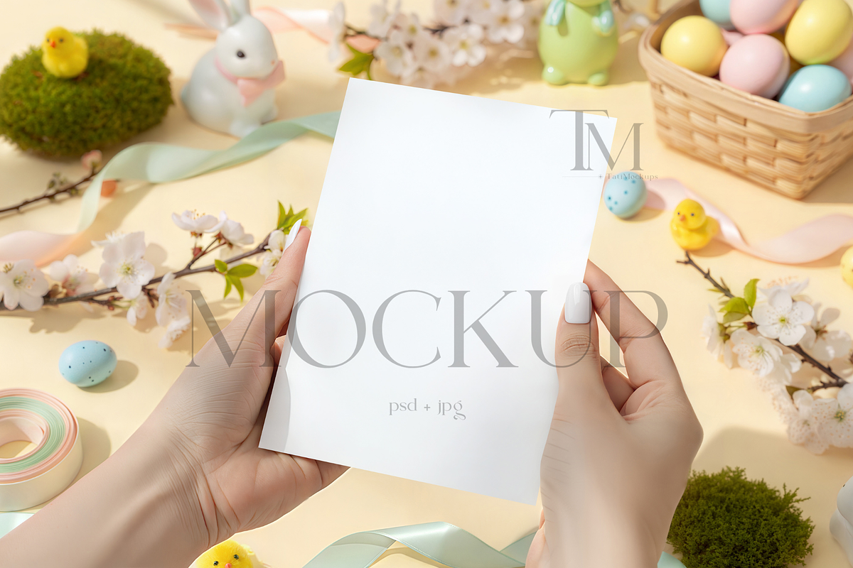 Hand Holding Easter Card Mockup, a Product Mockup by TatiMockup (Photo 1 of 4)