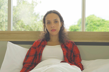 Depressed lonely sad emotional business latin woman is fired fro, a Person Photo by Tampatra