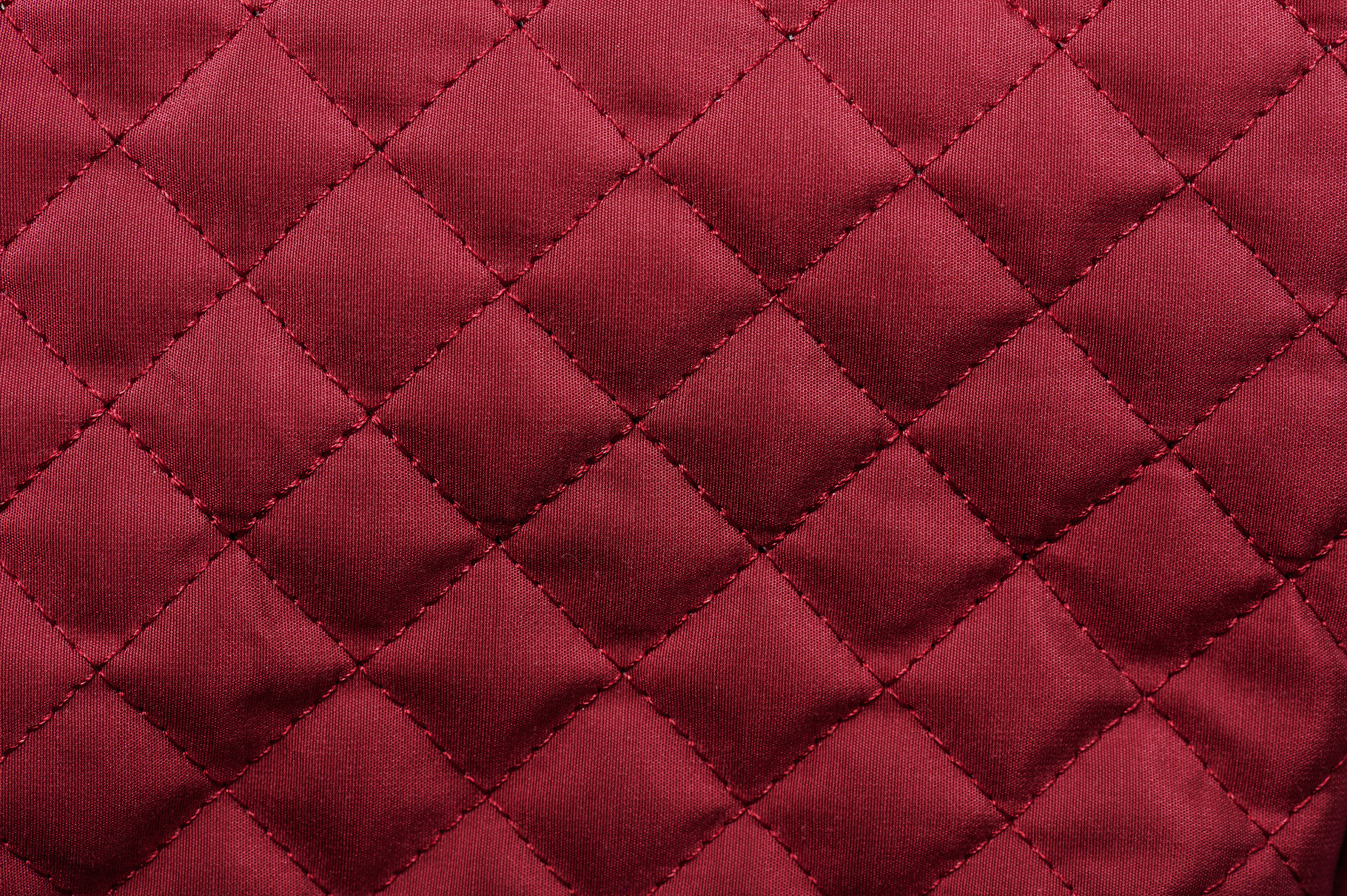 Red luxury tufted fabric texture, an Abstract Photo by PixieMe