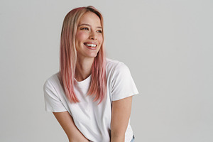 Happy smiling young blonde white woman