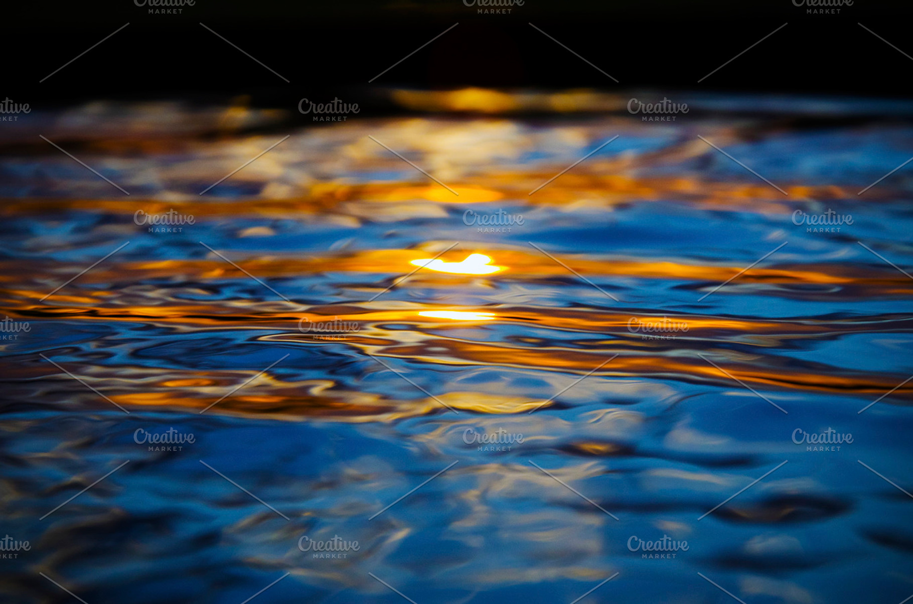 Sunset on the Water, an Abstract Photo by Joshua C. Carroll