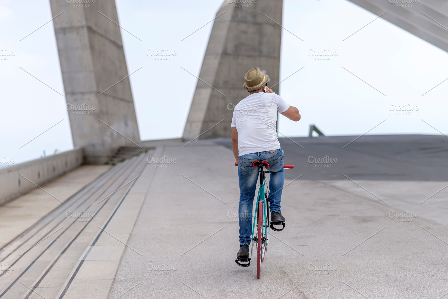 happy businessman walking outdoors with mobile phone, a Holiday Photo by 2Design