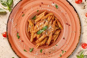 Delicious penne pasta with tomato sauce, a Photo by Grafvision photography