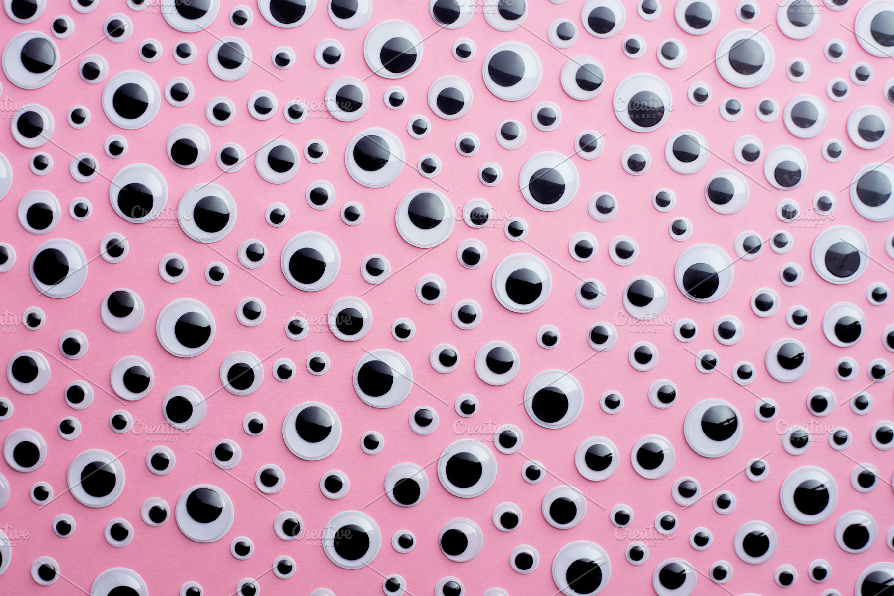 Googly eyes containing googly, eyes, and eye, an Abstract Photo by bogdandimages