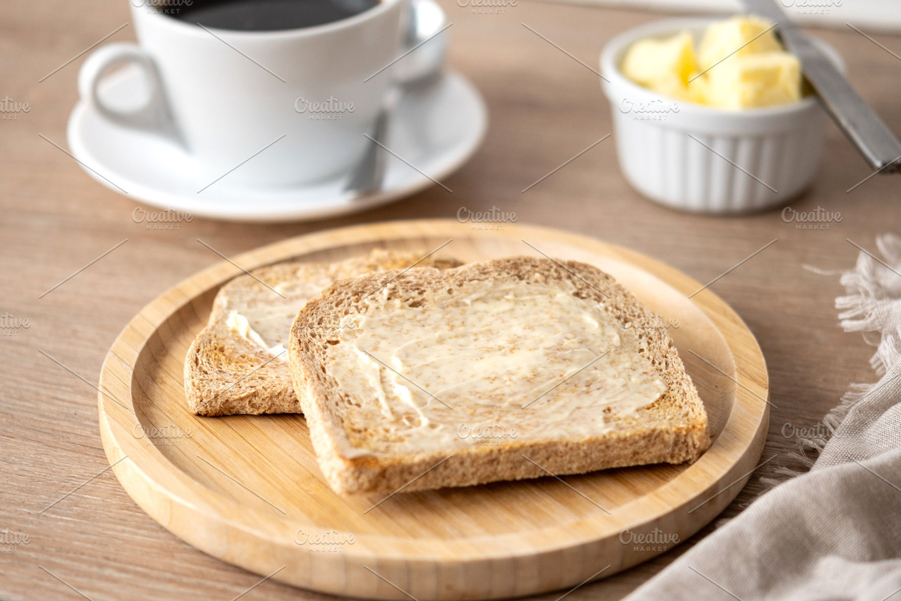 Buttered whole wheat toast with black coffee for breakfast, a Food & Drink Photo by etorres69