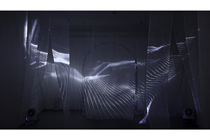 Light patterns projected on fabric, a Background Photo by Media Whale Stock