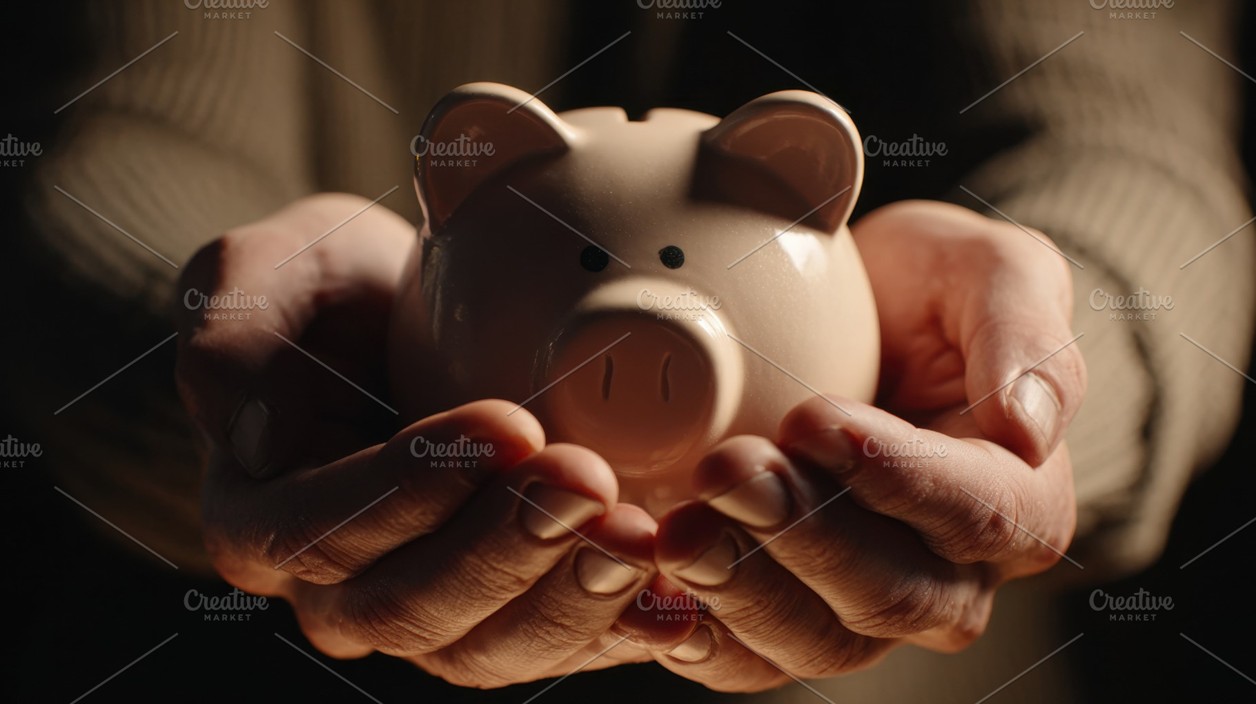 Hands hold a piggy bank in light, a Photo by Beautiful things