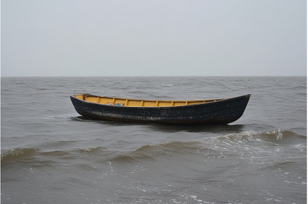 Fishing boat anchored on calm waters