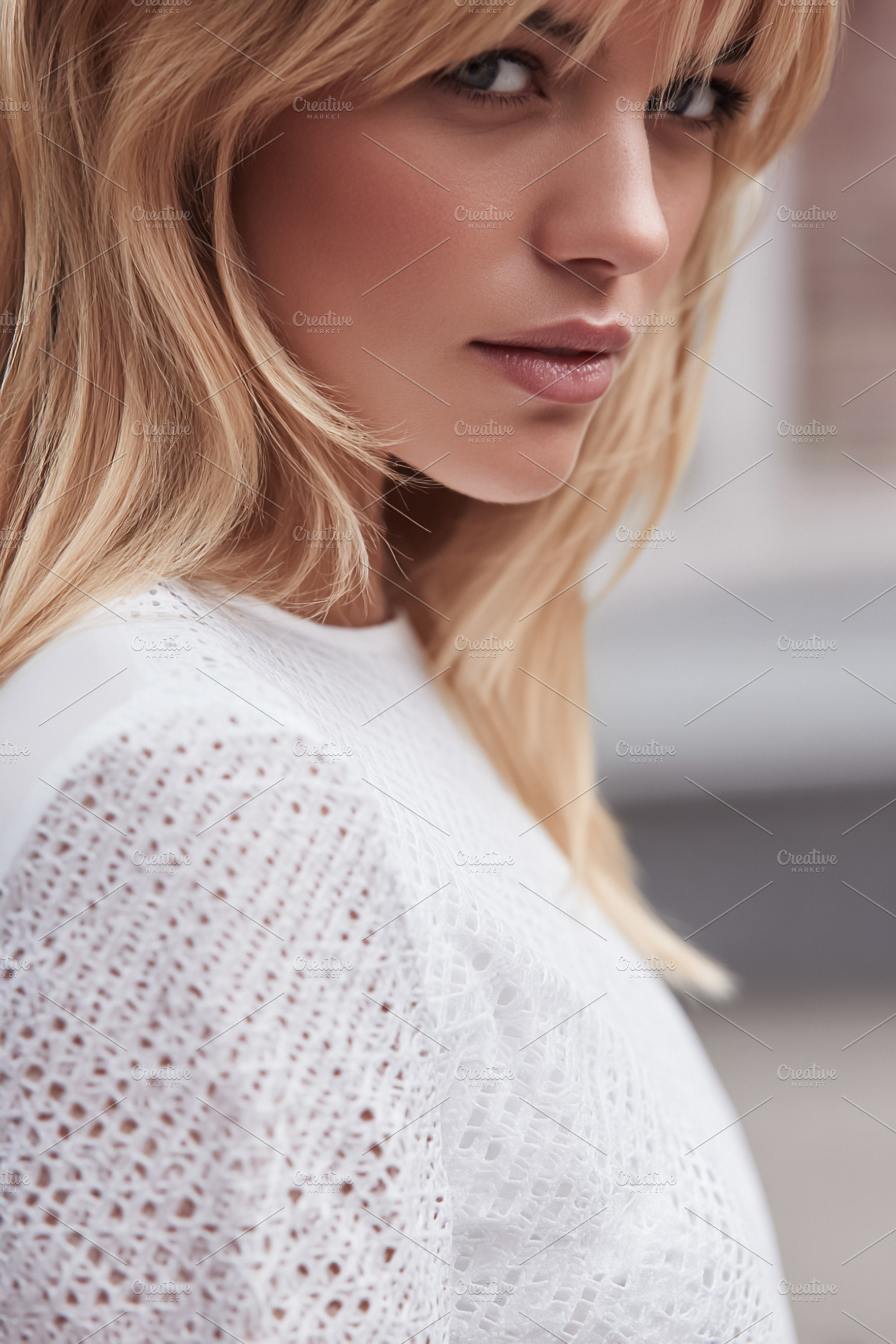 Blonde woman wearing trendy white lace top, showcasing modern fa, a Photo by Studio ANNA