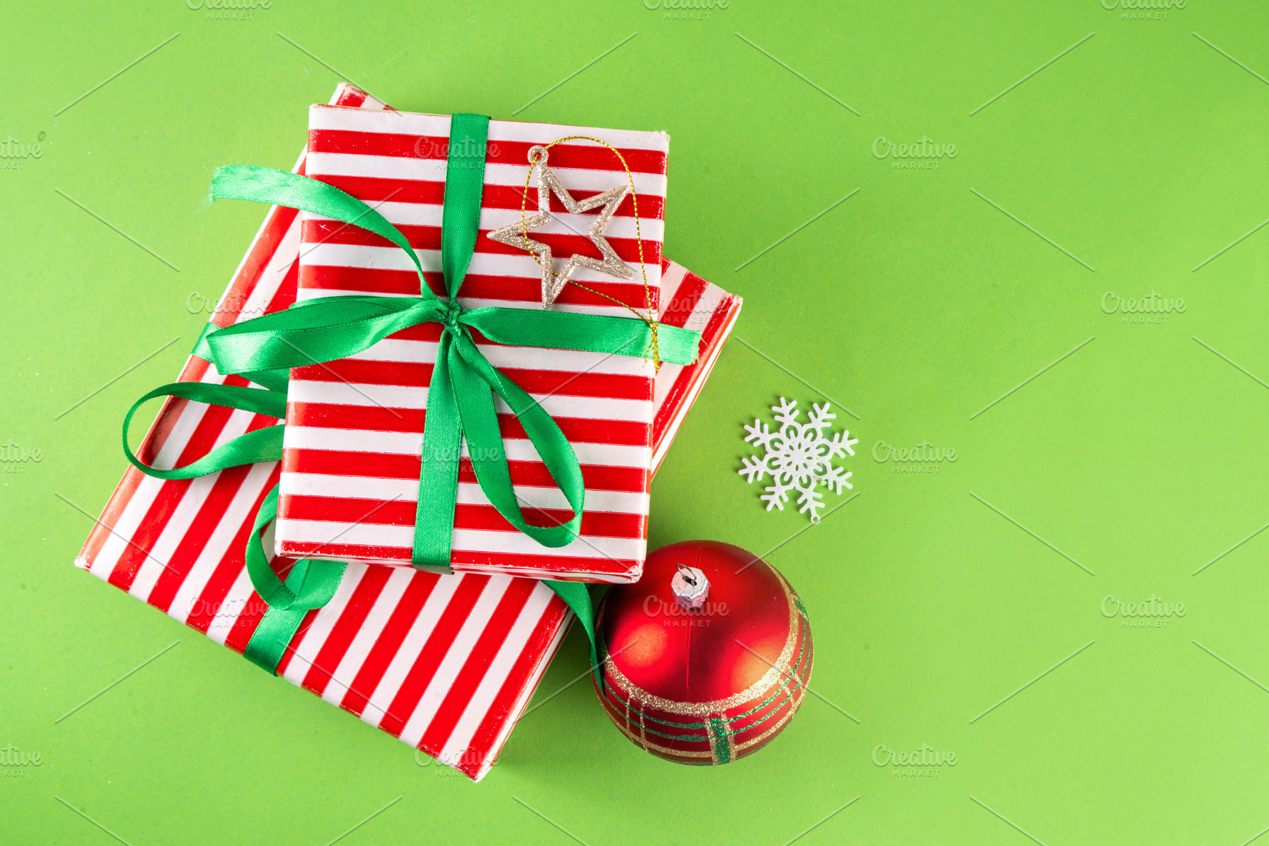 Bright high-colored background with Christmas boxes, festive bau, a Holiday Photo by Rimma