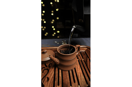 The Art of Tea Preparation Using a, a Food & Drink Photo by Media Whale Stock