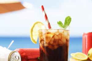 Cola in a glass with ice on a hot beach, a Food & Drink Photo by Davizro's Market
