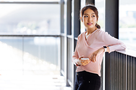 Asian woman leaning on handle stock photo containing woman and asian, a Person Photo by Twinster Photo